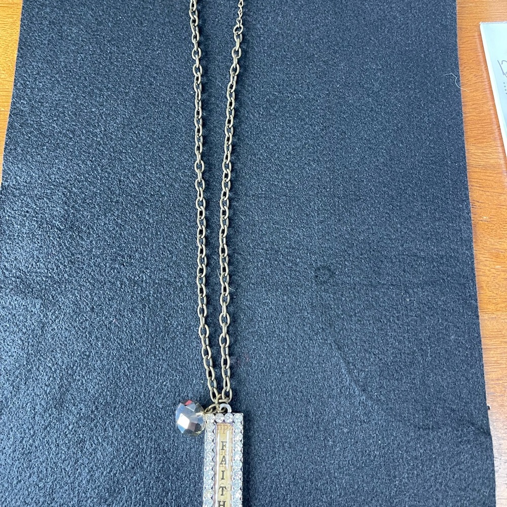 Faith Pendant Necklace in Gold and Silver